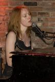 Alicia Witt performing