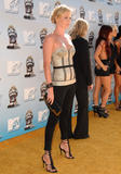 Charlize Theron shows cleavage in silver top at 2008 MTV Movie Awards