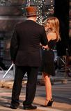 Jennifer Aniston leggy in black dress